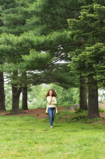 Central Park, New York City. Woman relaxing in park.