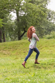Central Park, New York City. Woman running in park.