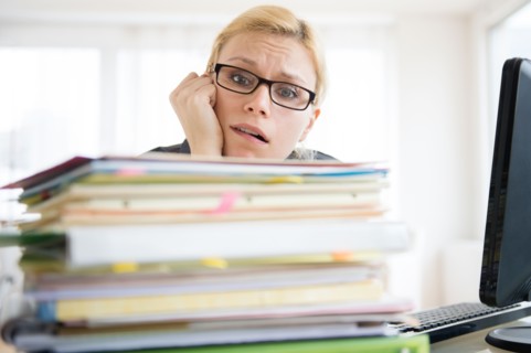 Young woman working at desk in office
