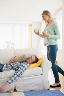 Woman taking car of sick man