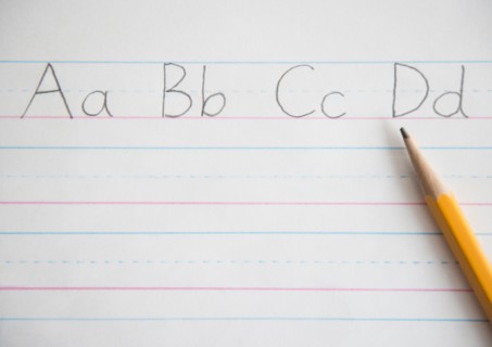 Studio Shot of note pad with written letters