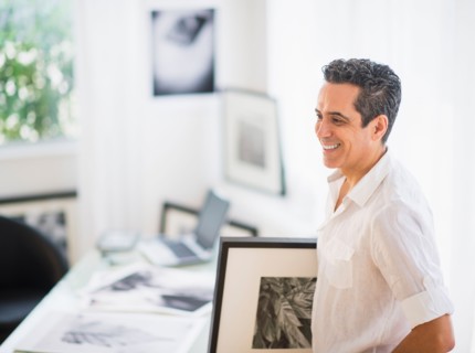 Portrait of man in his photography studio