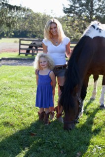 Mother with daughter (4-5) outdoors