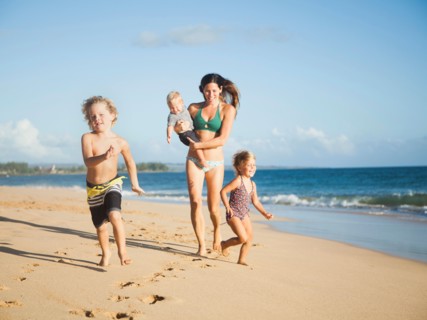 Mother with children on beach