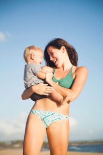 Mother with baby boy (6-11) in arms