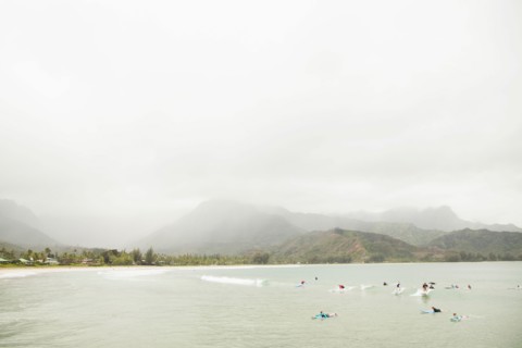 People swimming in bay