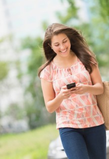 Woman texting on phone.