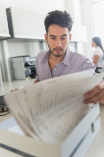 Businessman at work in office.
