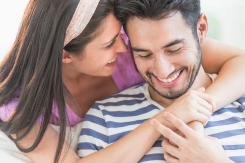 Young couple embracing.