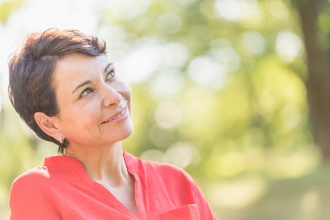 Portrait of happy mature woman smiling.