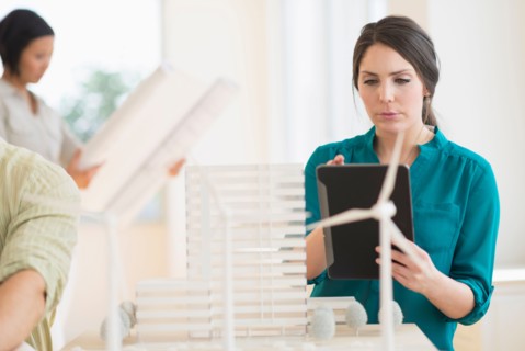 Architects working in office.