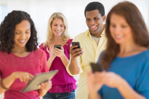 People using communication devices.