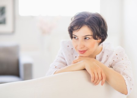Portrait of young woman daydreaming
