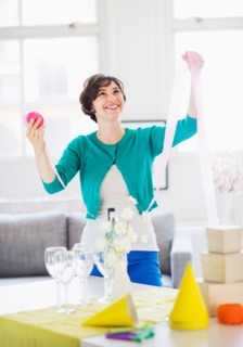 Woman decorating room for party