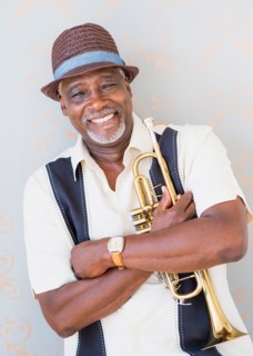 Portrait of man holding trumpet