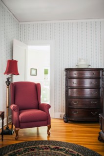 Empty room with armchair