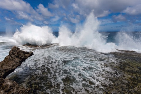 Wave crushing on rock