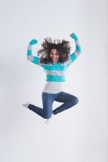 Studio Shot of girl (12-13) jumping