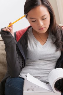 Girl (16-17) studying