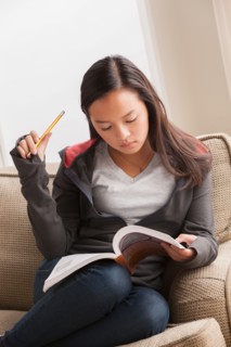 Girl (16-17) studying