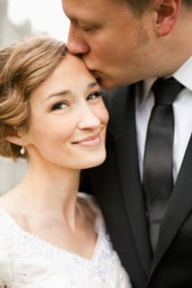 Newly wed couple kissing