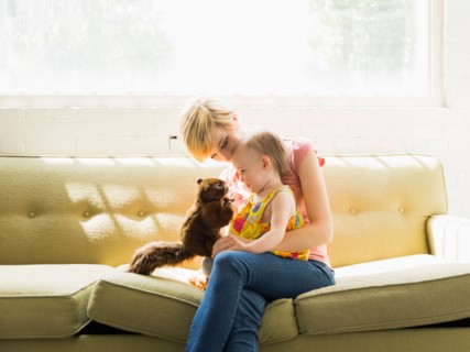Mother playing with baby daughter (12-17 months)