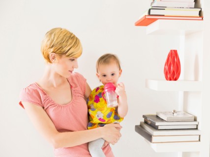 Mother with baby daughter (12-17 months)