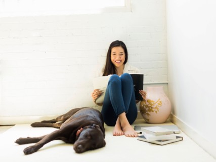 Young woman with labrador