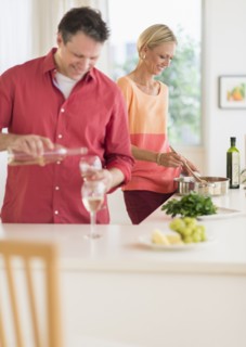 Couple cooking at home.