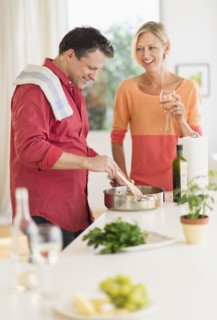 Couple cooking at home.