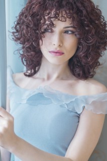 Portrait of beautiful brunette woman.