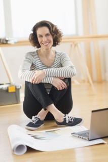 Woman sitting on floor.