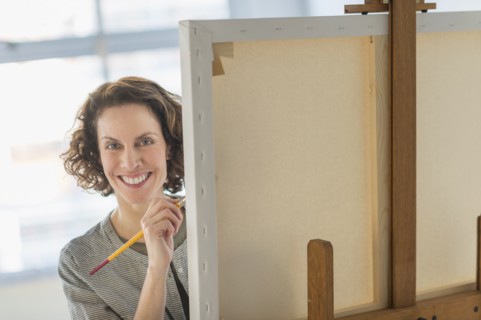 Portrait of artist in studio.