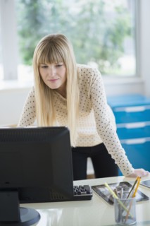 Female designer working on computer.
Photo : Jamie Grill