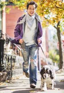 Teenage boy(16-17) walking with dog. USA, New Jersey, Jersey City.
Photo : Daniel Grill