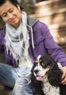 Teenage boy(16-17) with dog. USA, New Jersey, Jersey City.
Photo : Daniel Grill
