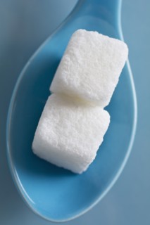 Sugar cubes on spoon.
Photo : Kristin Lee