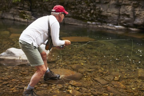 Fisherman on riverbank. USA, Colorado.
Photo : Kelly
