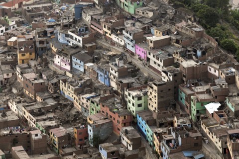 Aerial view to slums district. Lima, Peru.
Photo : Henryk Sadura