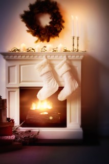 Christmas stockings on fireplace.