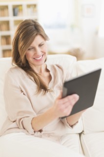 Woman using tablet pc.