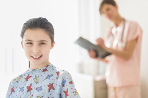Girl (8-9) in doctor's office.