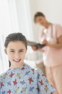 Girl (8-9) in doctor's office.
