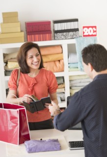 Customer paying in store.