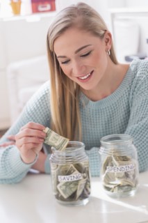 Woman collecting savings.