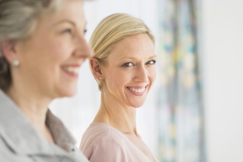 Profiles of two mature women.