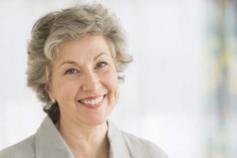 Portrait of smiling woman.