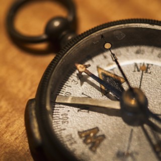 Studio shot of old fashioned compass.