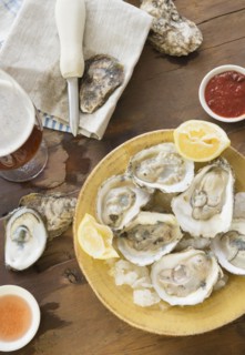 Elevated view of plate with oysters.
Photo : Jamie Grill