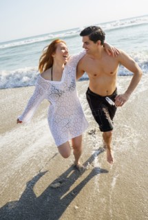 Portrait of couple on beach.